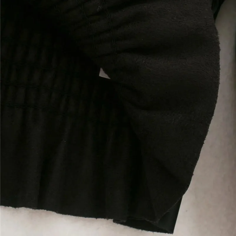 VEGAN SMOCKED BLOUSE